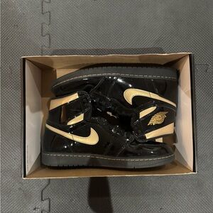 Jordan 1 Metallic Black and Gold